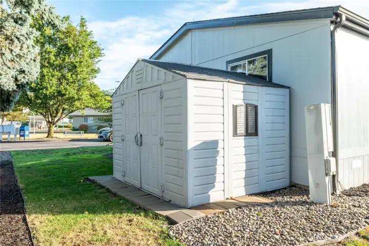 side yard with storage shed