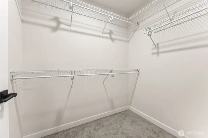 Walk-in primary closet.