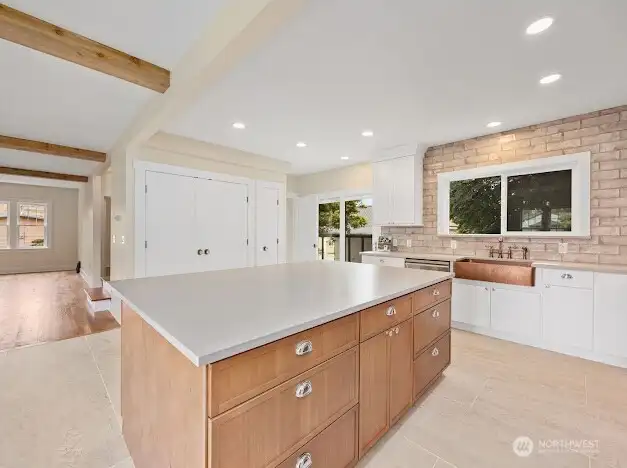 Kitchen.  Double door shown in photo has laundry hookups.
