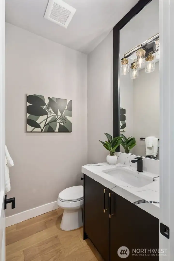 Conveniently located powder room.