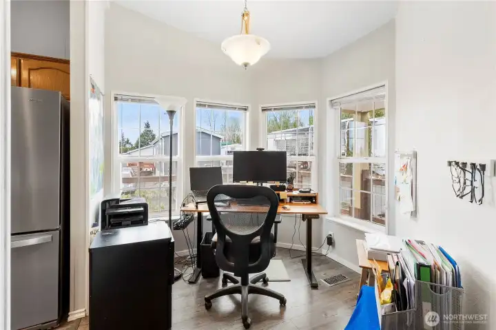 Breakfast eating nook or great flex space, currently used as an office to enjoy the outlook and bright windows.