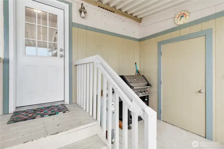 Storage shed located in the carport with electricity.