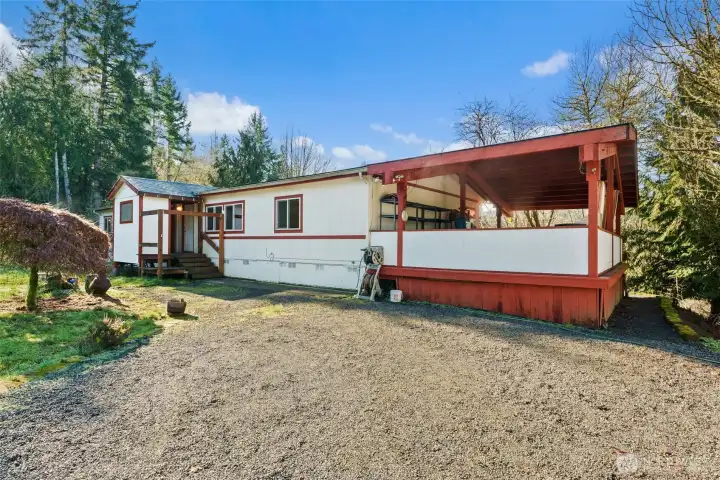 huge covered porch with lap pool