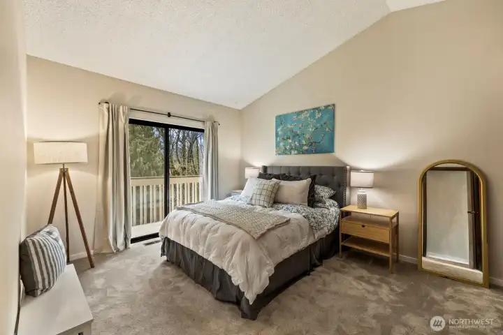 Your primary bedroom with vaulted ceilings...