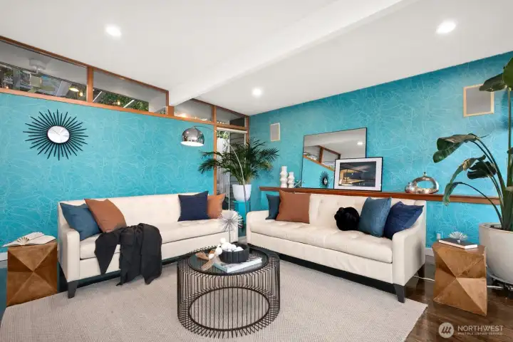 Another view of the light-filled living room...