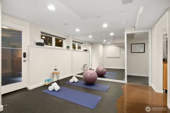 Resilient flooring makes for the perfect gym, play room, or studio space with exterior access.