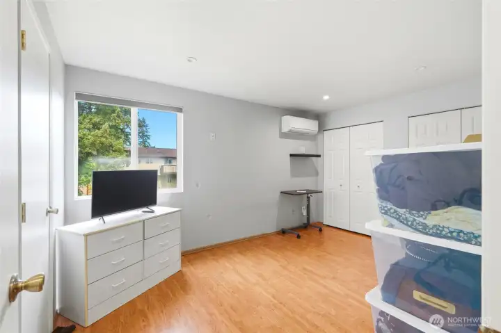 Double closet in primary bedroom and door to bathroom. Also mini split for comfort.