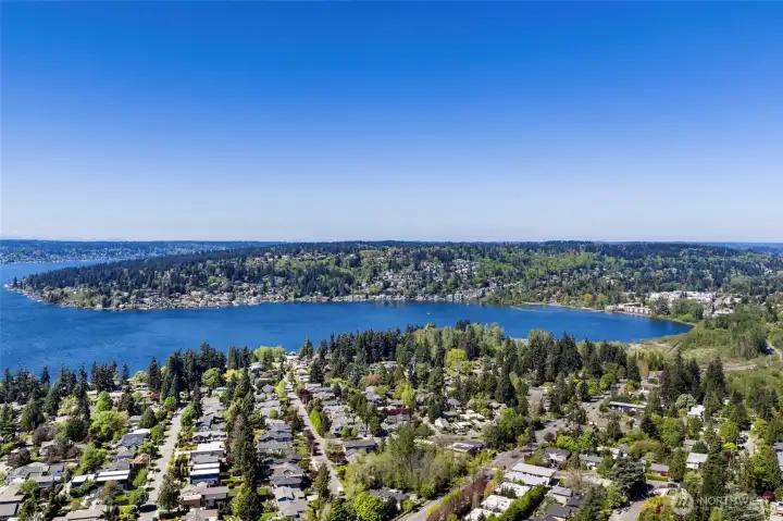 Aerial views of Lake Washington: Sweeping aerial perspective showcasing the home's coveted East of Market location with Lake Washington beyond.
