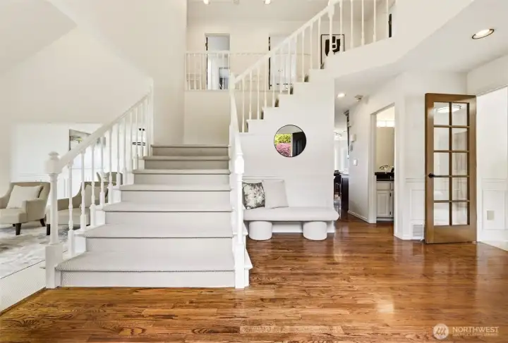 A gracious foyer introduces the home’s scale and natural light.