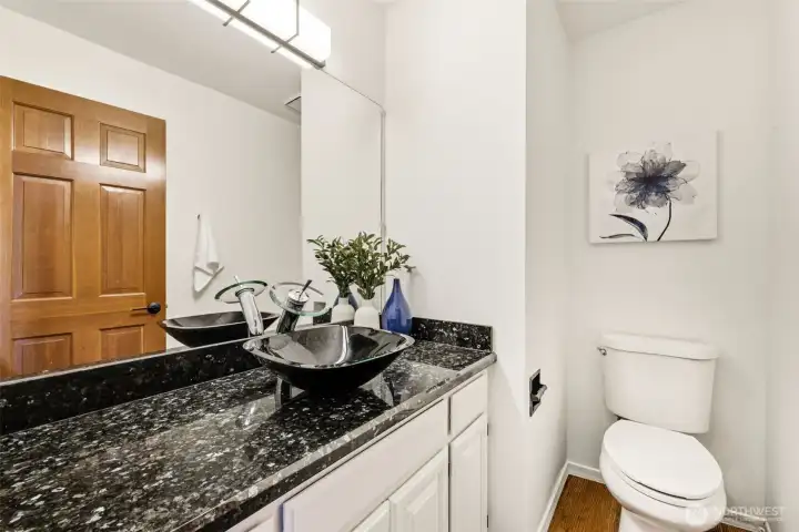 A convenient main floor powder room for guests.