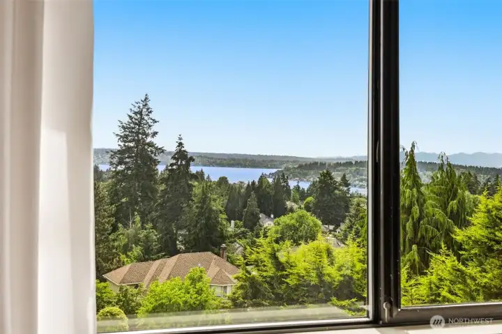 Wake up to beautiful Lake Washington views from the primary suite.