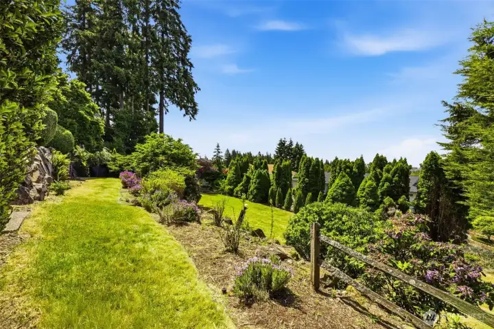 Established grounds and mature landscaping create a peaceful outdoor backdrop.