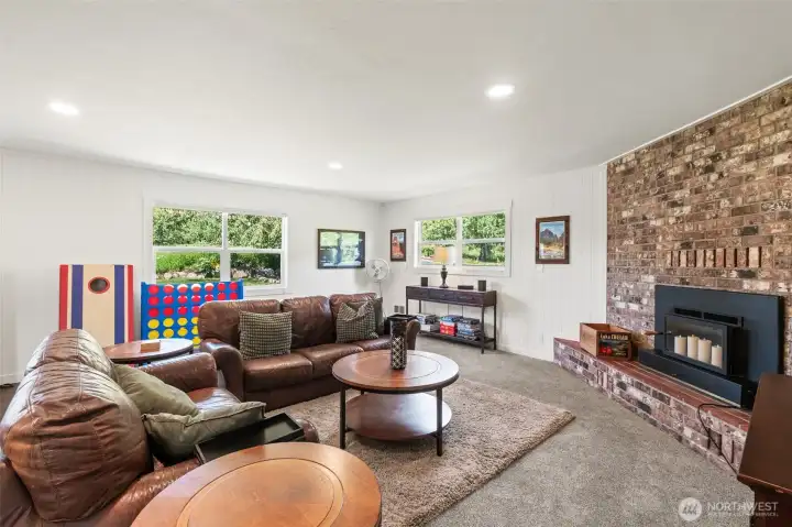 Wood burning fireplace in second living space. Wood burning fireplace in second living space.
