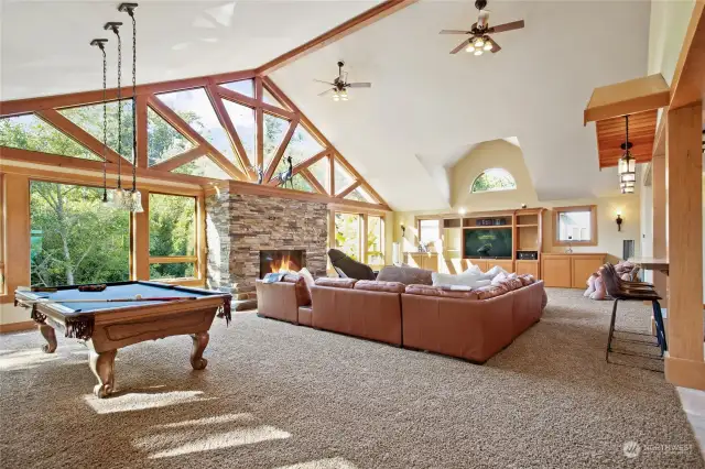 Mountain retreat style family room with resort sized real stone fireplace. Perfect for cozy fall and winter evenings.