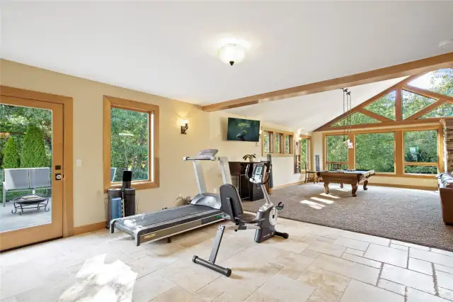 Perfect area for a weight room with swivel television to work out to, or just enjoy the peaceful surroundings. Could also be a great card table room or whatever else you desire.