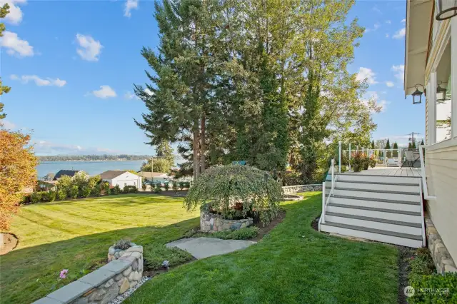 Welcoming property with built in fire pit on upper level, perfect for entertaining and sitting at while enjoying the yearly fireworks display on Lake Stevens or any normal evening.  The views do not disappoint!