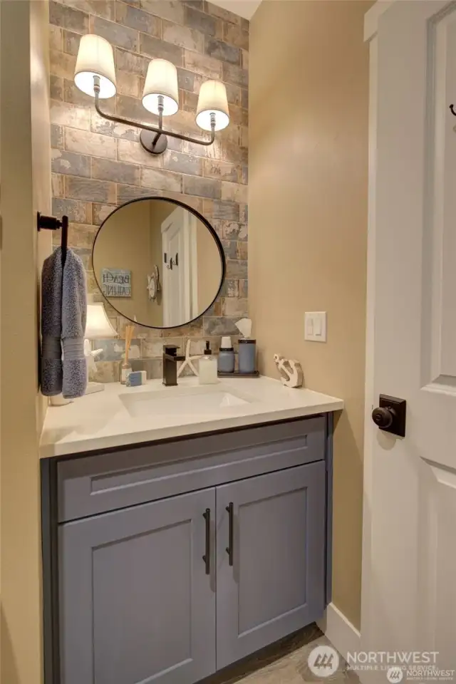 Upgraded cabinets and fixtures in the main bath
