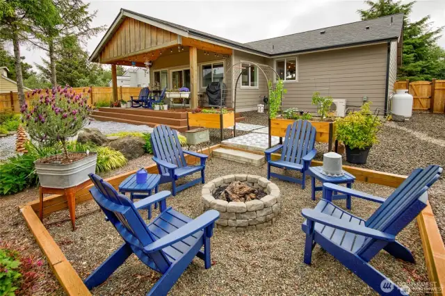 Gather around the plumbed propane fire pit - all the fun...none of the mess