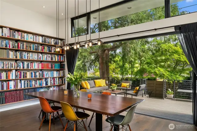 Love the built-in bookshelves, book spines always give such a great feel to a home.  Outside you have a deck for entertaining and below that a charming private courtyard!