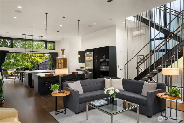 As you can see...the interior is magical. Modern in asthetic but not stark due to the interesting use of materials.  At the back of the photo you can see how the La Cantina doors opens to bring the outdoor living area into the home!