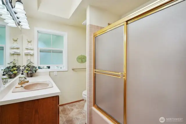 Full bath located by 3 bedrooms