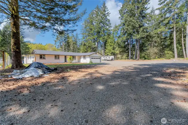 Driveway to house, 160 yards of gravel brought in and spread