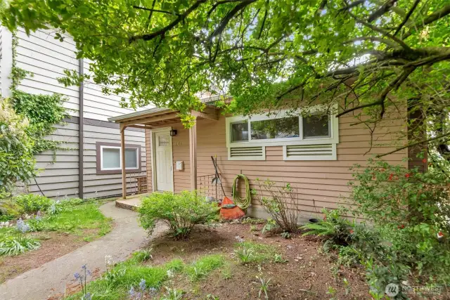The property has two units. This is the entry to the upstairs unit. It is vacant but the downstairs unit is leased.