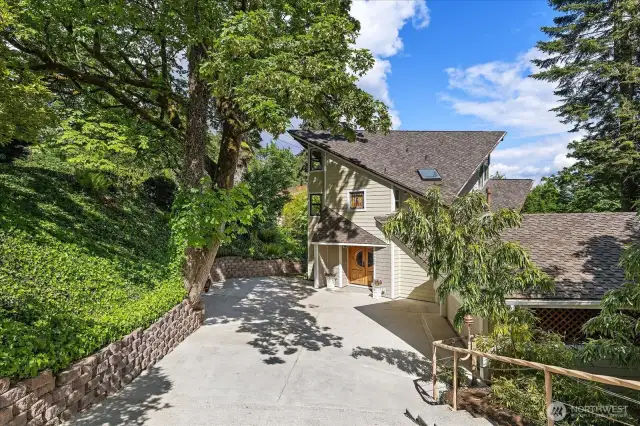 Beautiful Setting with Lake & Mt. Rainier views. Engineered driveway fully permitted and approved by the City of Mercer Island