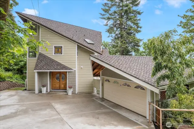 New 50yr Presidential Roof and Newer Hardie Plank Siding. Grated cement driveway worth its weight in gold.