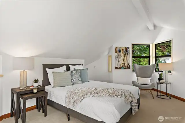 Loft bedroom with private roof top deck.