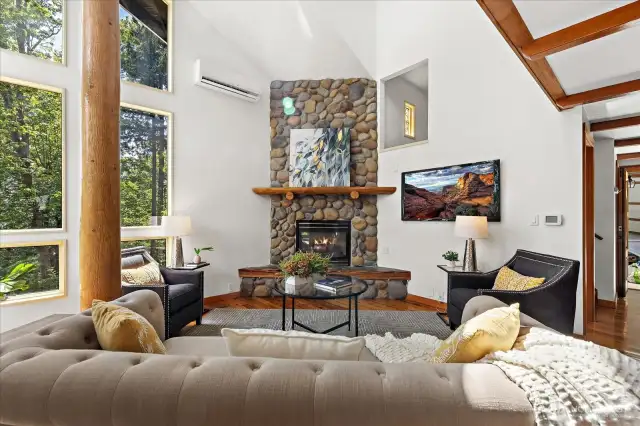 Vaulted ceilings, dramatic river rock fireplace. Enjoy Mother Nature front and center like your own wildlife movie. Great room concept for entertaining
