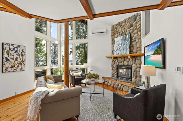 Wonderful natural light floods into the house. Antique Petrified wood was used throughout the home. Enjoy lake & Mt. Rainier views.
