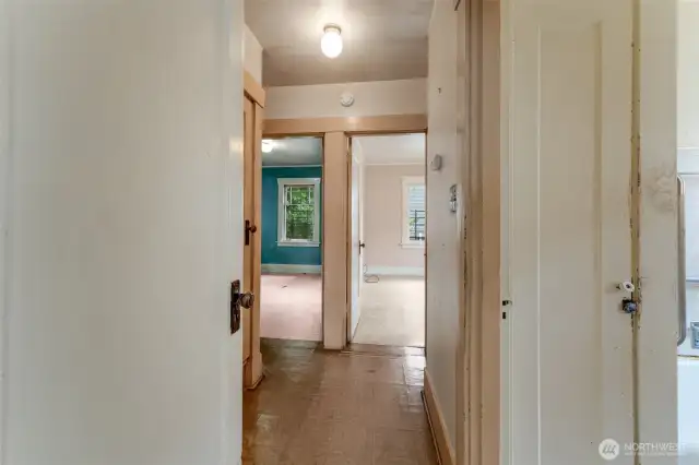 Gracious hallway to the bedrooms.