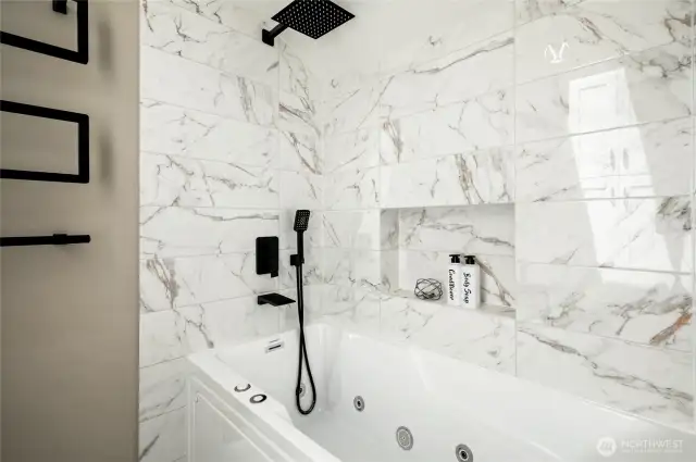 The jetted tub in the primary bath. There is also a skylight with rain detection/auto-close.