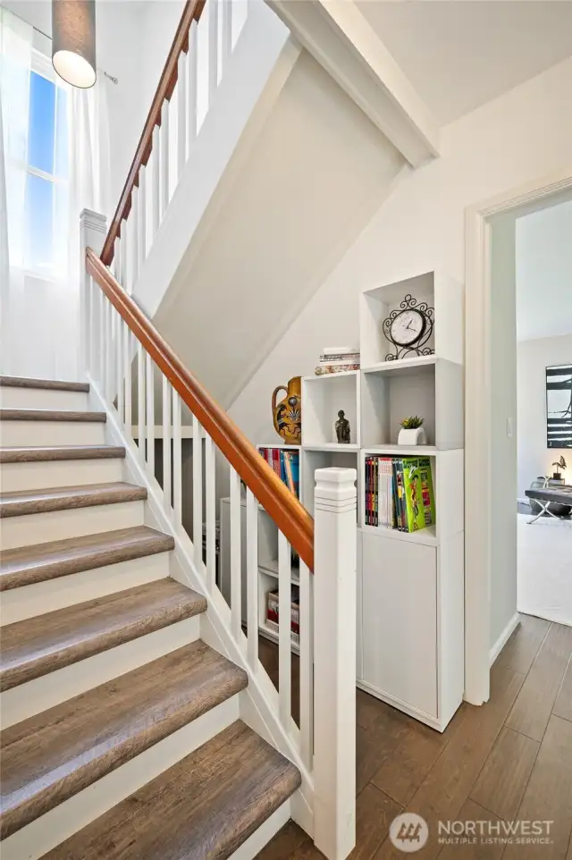 Staircase with built-ins to the side.