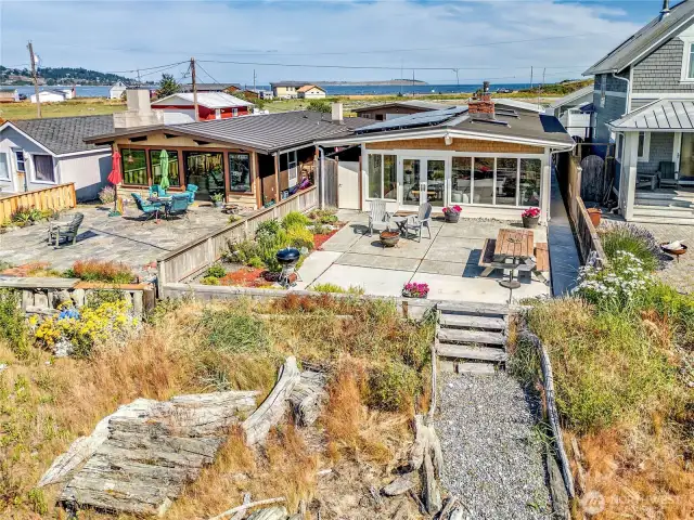 The home has a private pathway leading down to the water's edge.