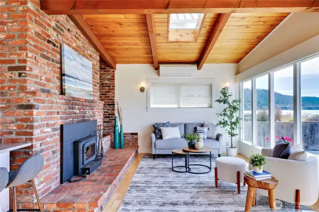 The massive brick fireplace and hearth add so much character.