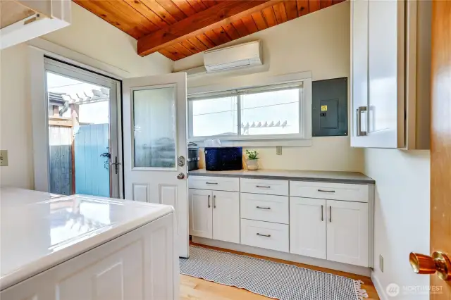 Laundry room with great storage.