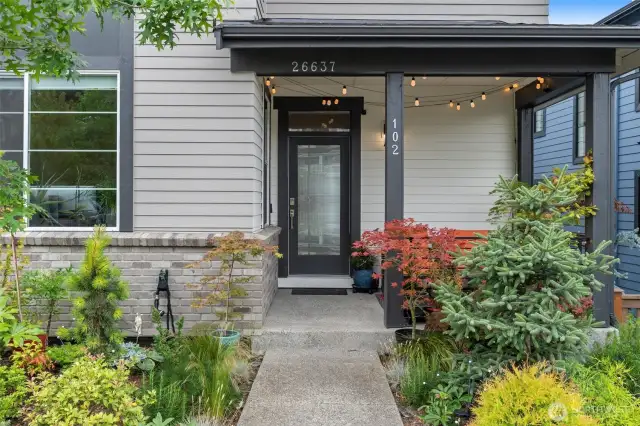 Step into convenience and style through the inviting entry of this charming townhome. It's the perfect welcome home.
