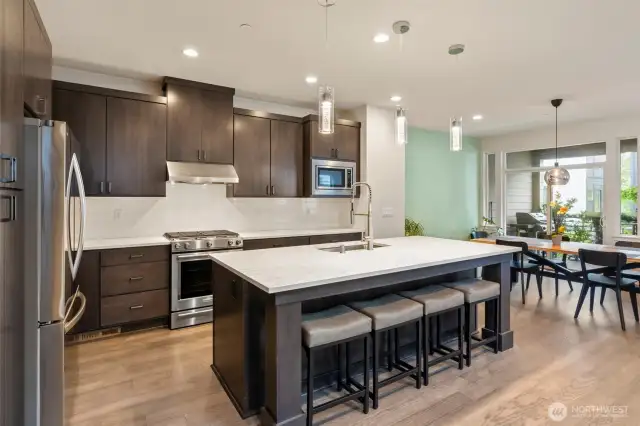 An inviting eat-in kitchen with a spacious dining area, seamlessly blending functionality and comfort for casual meals and gatherings.