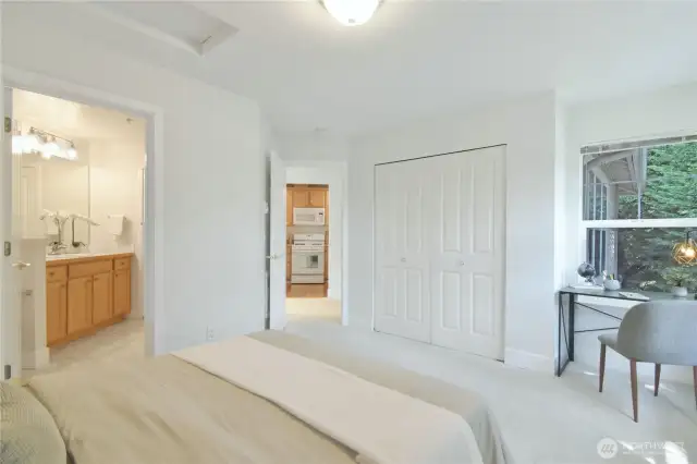 Large bedroom with access to a shared bathroom