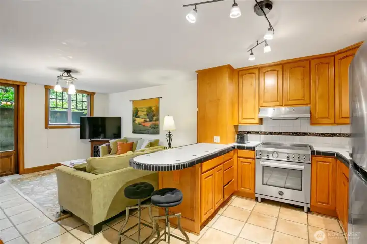 Lower level kitchen and living. Notice the daylight entry to the south side of the property.