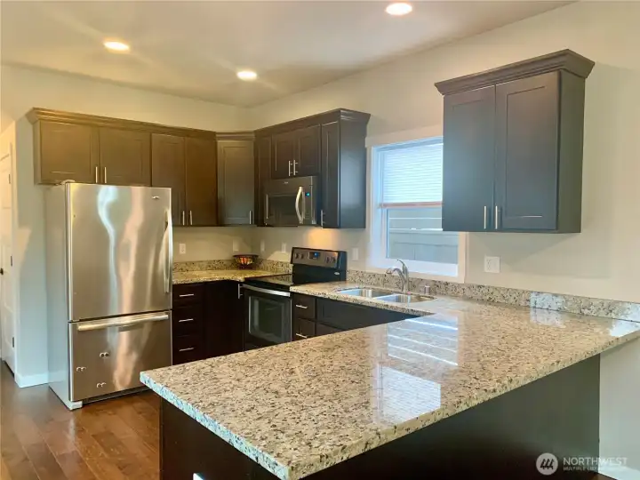 Kitchen with granite countertops