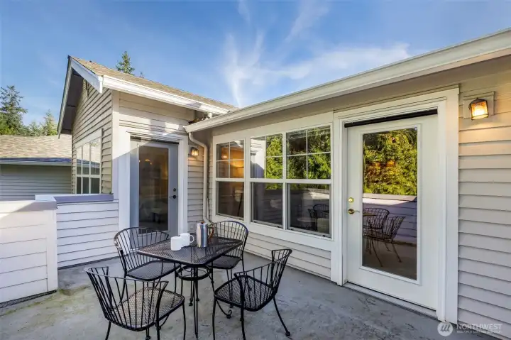 Spacious deck offers access from living room and primary bedroom.