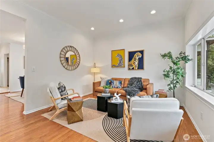 Tall ceilings, big windows, and fresh paint throughout.