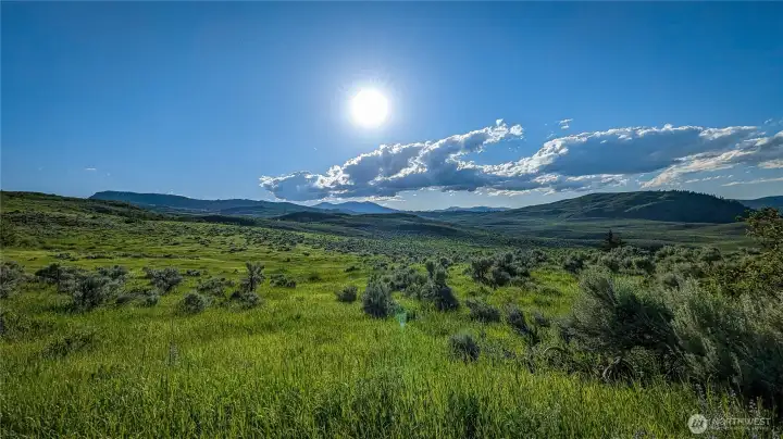 The Okanogan Valley at its finest. Looking north from the S-area, you get the absolute best vantage point of the valley's rolling hills and open sky. This isn't just a view; it's a lifestyle."