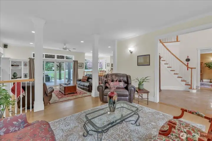 The living room flows perfectly into the family room The living room flows perfectly into the family room