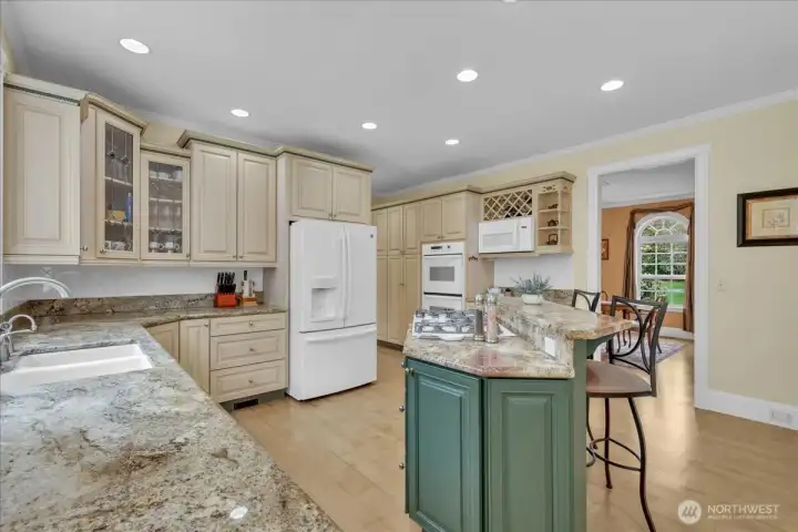 Complete with KraftMaid cabinets, granite counters, double oven and propane range, this kitchen is precisely what you're looking for! Complete with KraftMaid cabinets, granite counters, double oven and propane range, this kitchen is precisely what you're looking for!