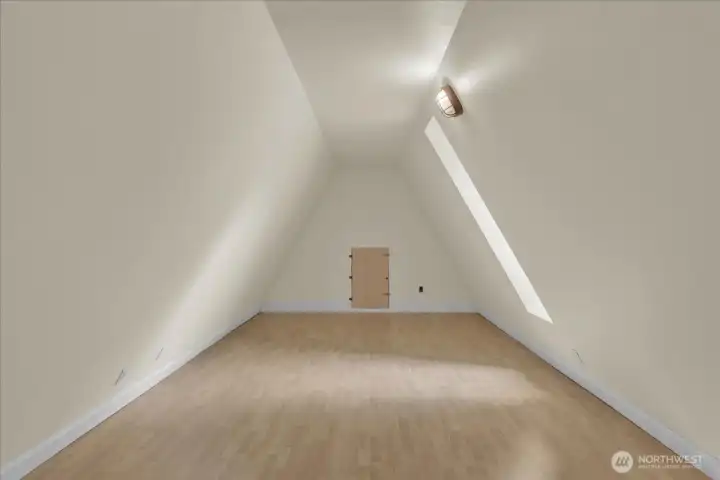 Above the bonus room is this finished attic space, perfect for your storage needs Above the bonus room is this finished attic space, perfect for your storage needs
