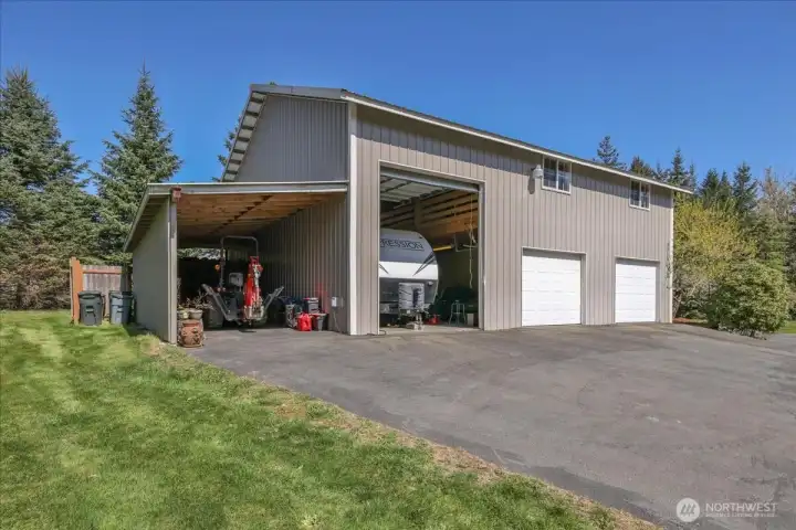 No need to continue to pay for parking your RV or boat. The shop has a 12' door! No need to continue to pay for parking your RV or boat. The shop has a 12' door!
